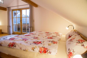 Гостиница Ferienwohnung Rosalie  Розенхайм